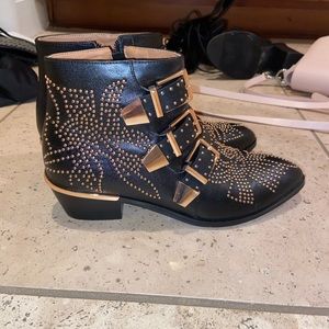 Black and gold booties